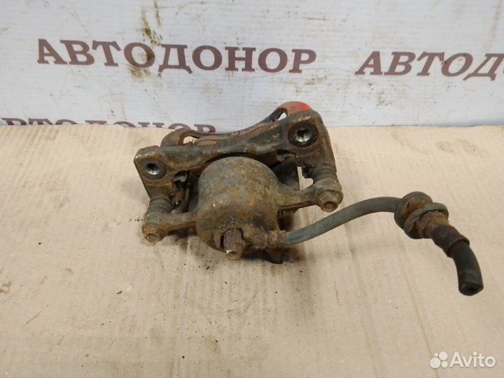 Суппорт тормозной передний левый Chevrolet Aveo