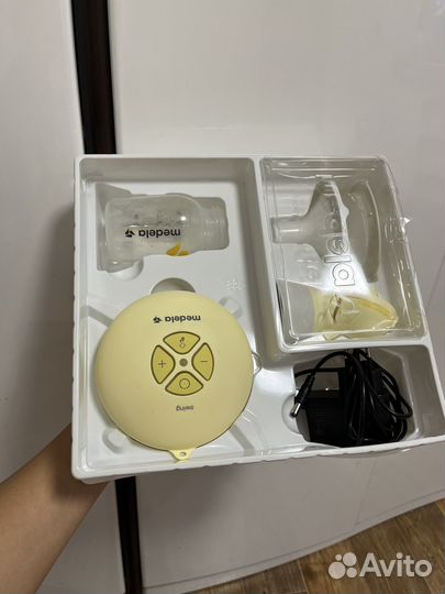 Молокоотсос medela электрический