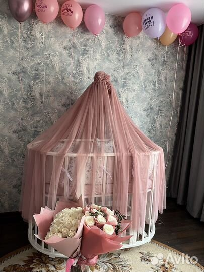 Детская кроватка с маятником