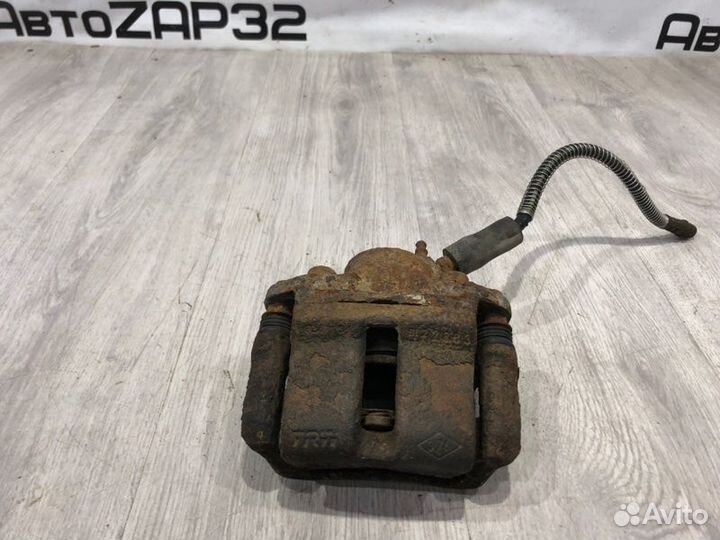 Суппорт тормозной передний левый Renault Symbol