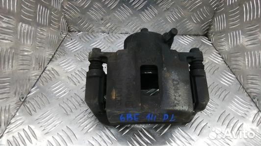 Суппорт тормозной передний левый chevrolet tacuma