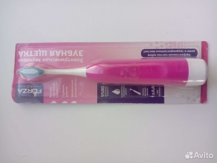 Электрическая зубная щетка