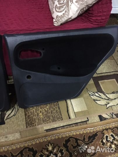 Обшивки задних дверей на ваз2114
