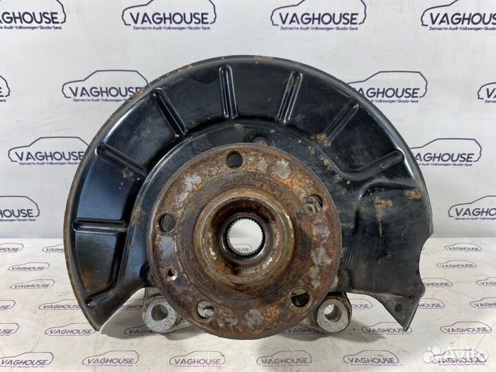 Кулак поворотный передний левый Volkswagen Passat