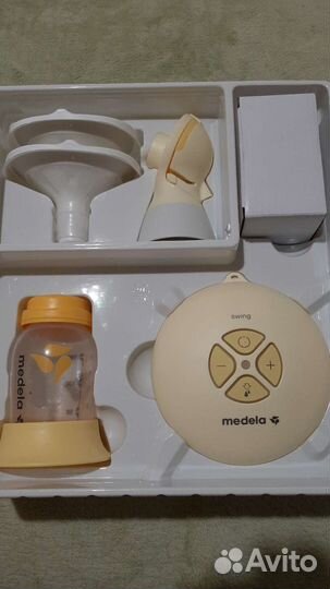 Молокоотсос medela swing flex электрический