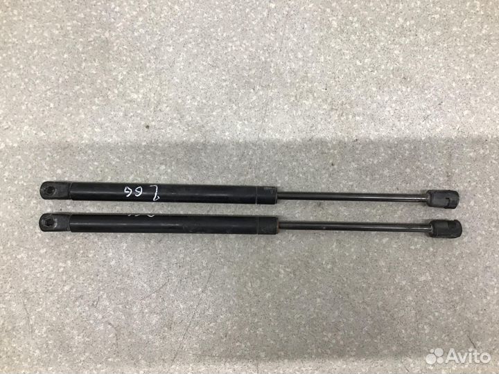 Амортизатор двери багажника Chevrolet Aveo (T200)