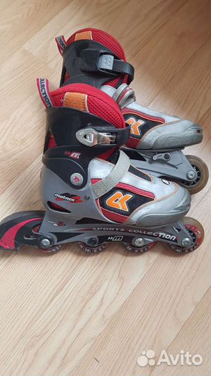 Роликовые коньки