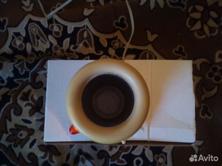 Рабочий электроподогреватель детского питания или