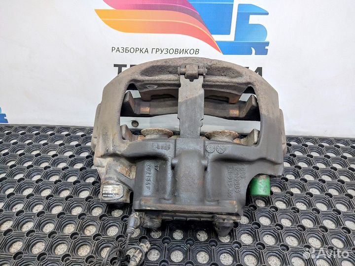 1658010 Суппорт передний левый