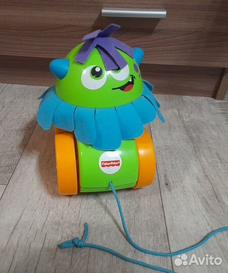 Игрушка каталка Fisher Price Монстрик