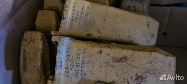 Коронки на ковш caterpillar