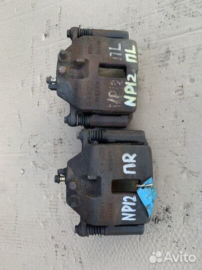 Суппорт тормозной передний для Nissan