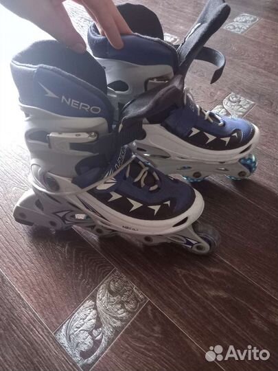 Роликовые коньки