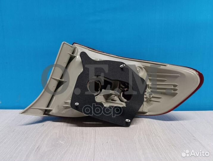 Фонарь левый внешний Toyota Corolla 10 E150 200