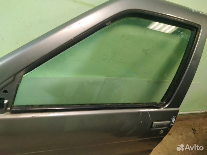 Стекло двери переднее левое Nissan Terrano R50