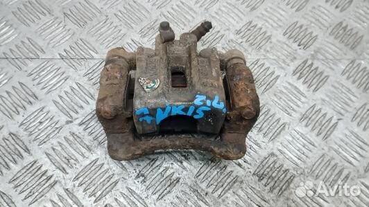 Суппорт тормозной задний левый KIA sportage 3 (7NK