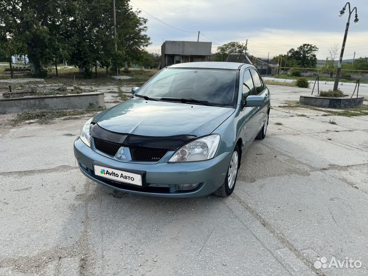 Mitsubishi Lancer 1.6 МТ, 2006, 213 000 км