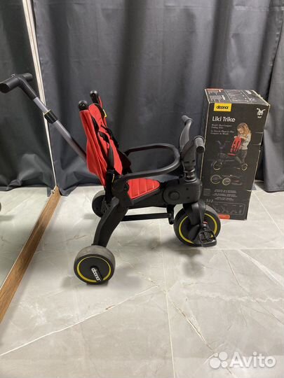 Детский велосипед с ручкой doona красный