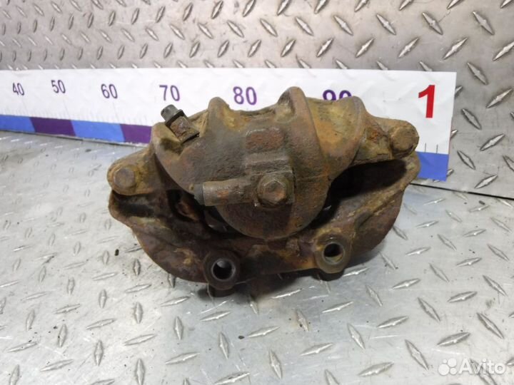 Суппорт передний левый Opel Omega B