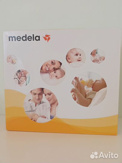 Молокоотсос medela mini electric