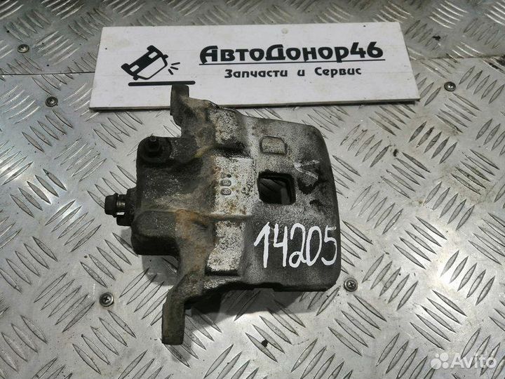 Суппорт тормозной передний левый Nissan Teana J31