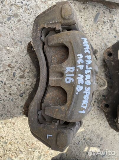 Суппорт тормозной pajero sport 1