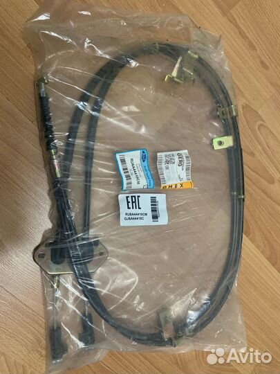 Трос стояночного тормоза RU6A44410CM ruei