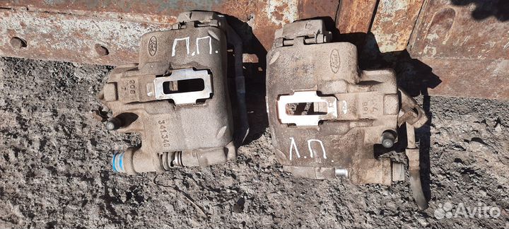 Суппорт тормозной Ford Escort