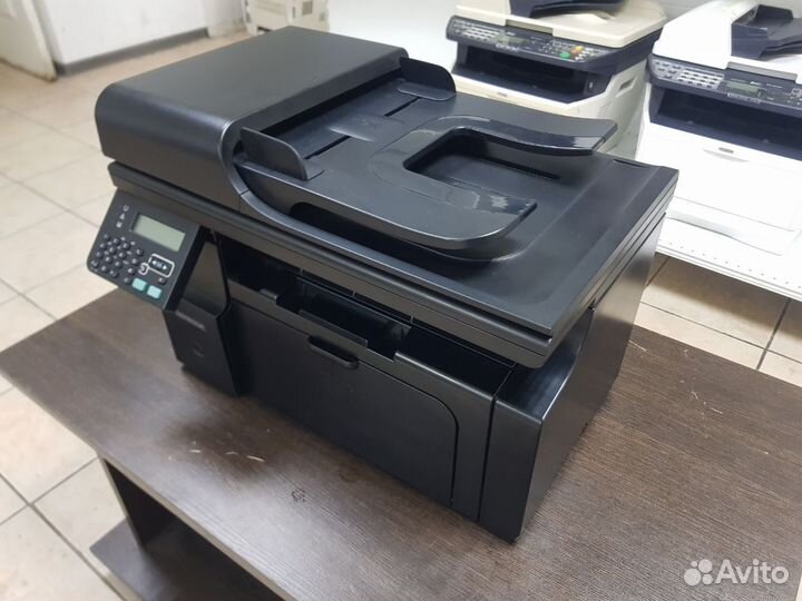 Лазерное мфу HP LaserJet M1212nf MFP