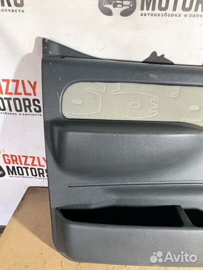 Обшивка боковой двери передняя левая Peugeot