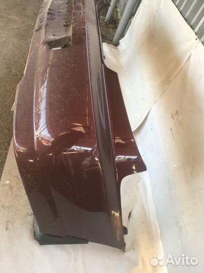 Бампер задний Kia Spectra 2001–2011