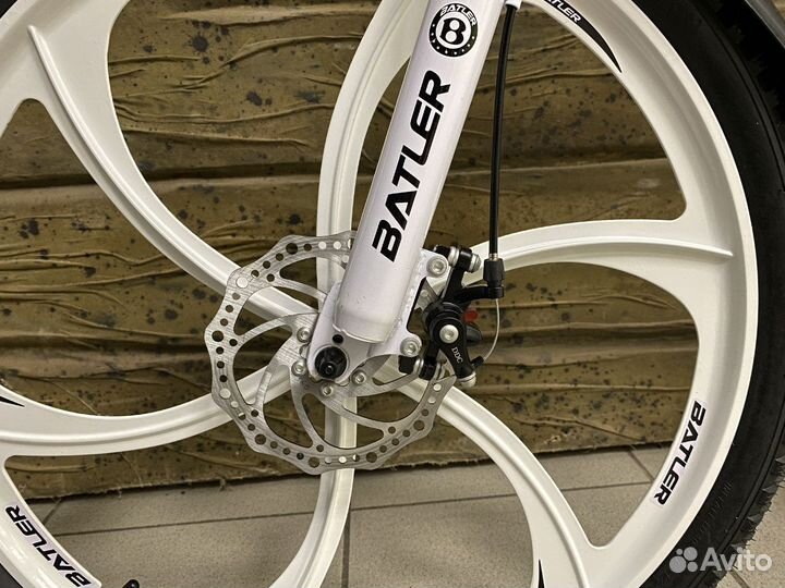 Велосипед на литых дисках складной белый