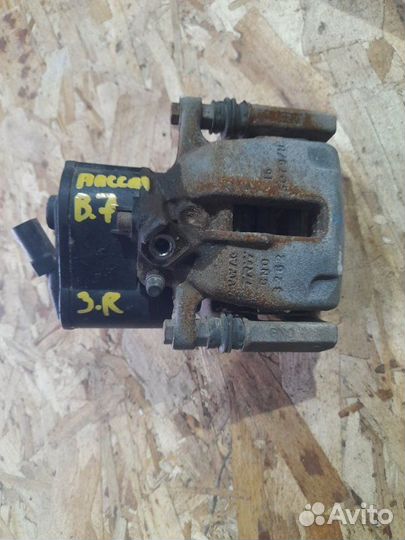 Суппорт задний правый Volkswagen Passat B7