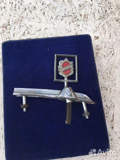 Олдсмобил значек