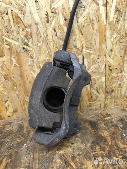 Суппорт тормозной передний левый Skoda Fabia 2