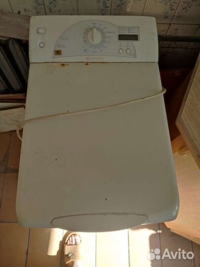 Вертикальная стиральная машина Ariston ATD 104