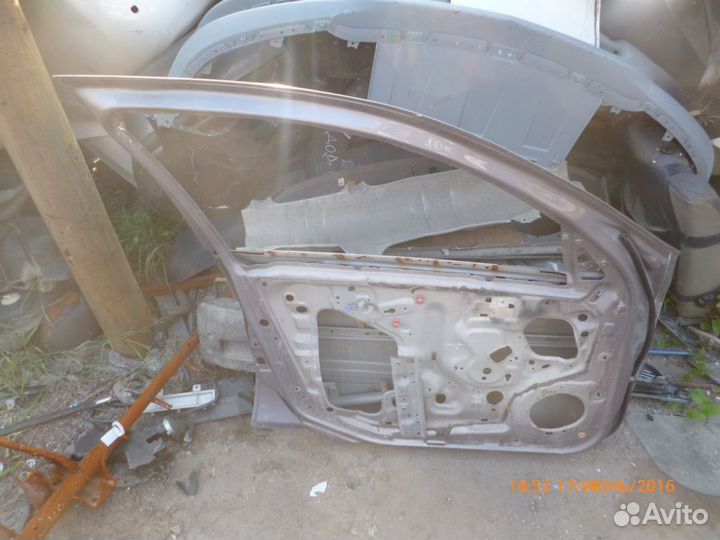 Дверь передняя левая Ниссан Блюберд Силфи