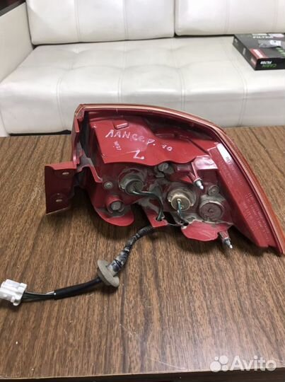 Фонарь левый в крыло Mitsubishi Lancer 10 X