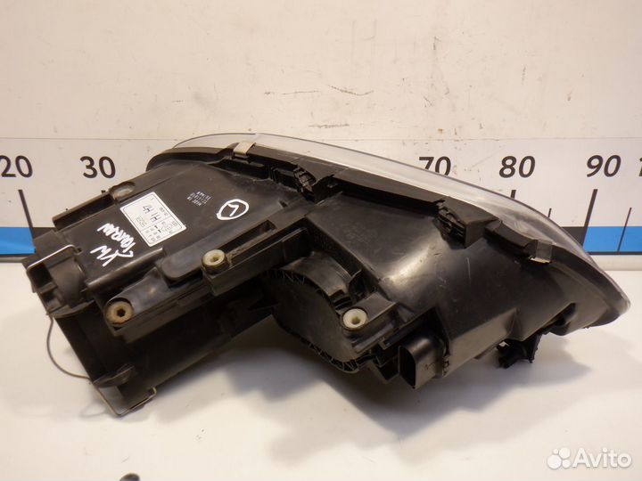 Фара левая VW Touran 2003-2010