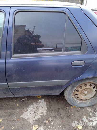 Двери Ford Fiesta 2000 год