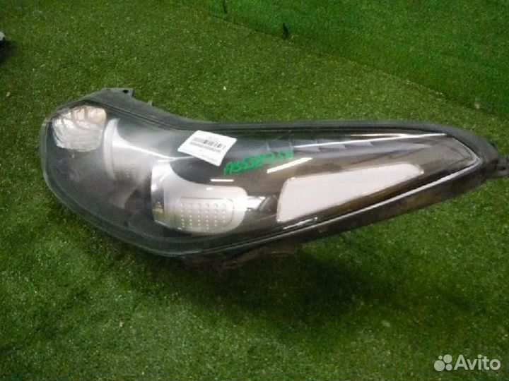 Фара левая Kia Sportage
