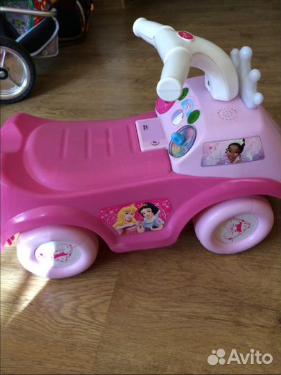 Машина каталка музыкальная