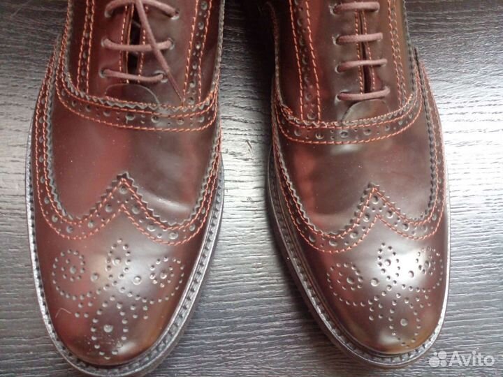 Новые кожаные ботинки