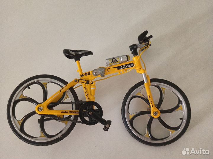 Игрушка велосипед