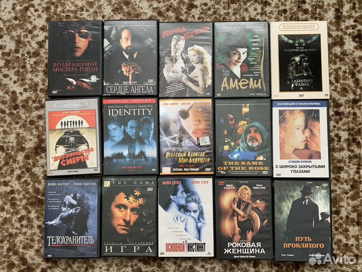 Коллекция DVD дисков с фильмами и сериалами