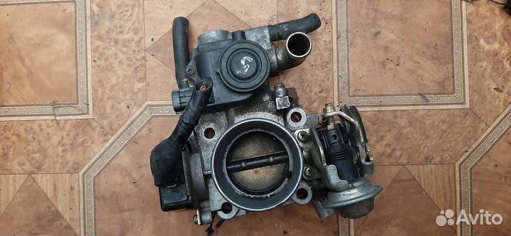 Дроссельная заслонка Mazda 323 1799500161