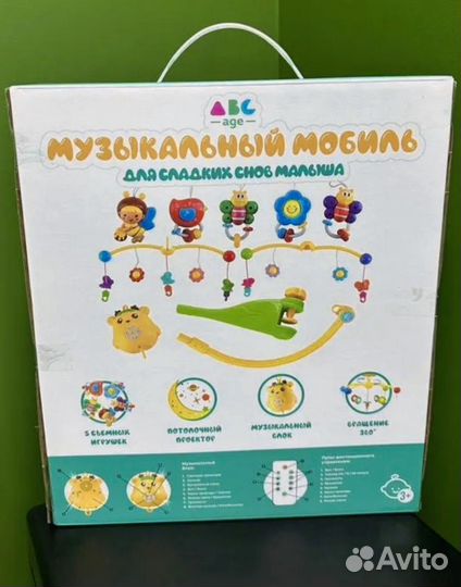 Детский мобиль в кроватку музыкальный