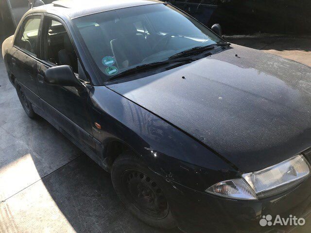 Разбор на запчасти Mitsubishi Carisma