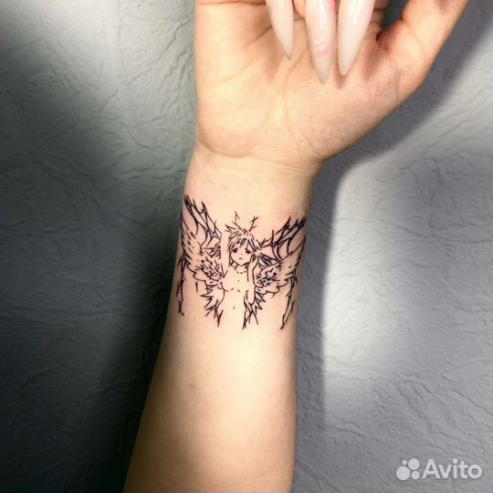 Мастер татуировки