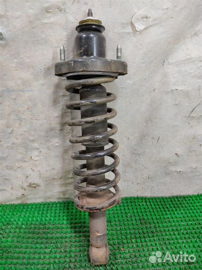 Стойка амортизатора задняя Mitsubishi Lancer 10 2